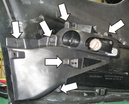 NOTE: The fog lamp locator pins must be on the bottom-outboard