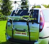 It is installed onto the rear spare tyre and carries 2 bikes. The structure can be assembled on either the right or left side where the spare tyre is located.