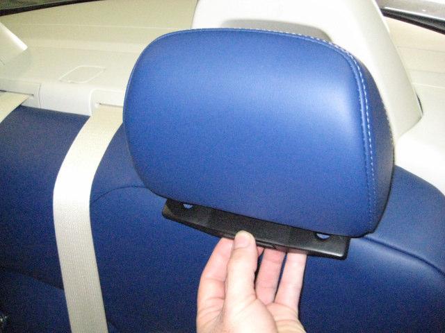 Rear Under Head Rest Receiver Installation (a) With the rear head rests in the up position, install the under head rest