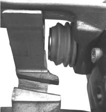Figure 63: Excessive grease on guide pin and boot IMPORTANT: The face of the guide pins and the contact areas of the brake carrier must be clean and free of grease