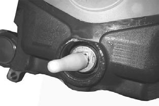 Positioning mounting cap Boot seats Figure 81: Inspecting adjuster 4. Clean the brake caliper adjuster boot seat. (Figure 81). B. Placing mounting cap over adjuster Figure 82: Installing mounting cap 5.
