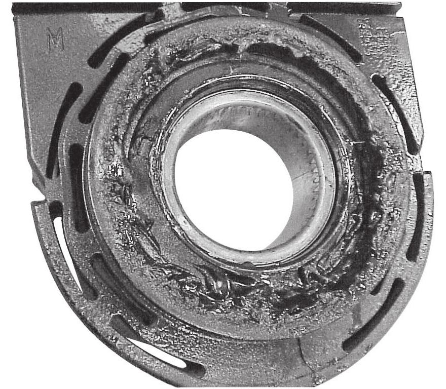 Center Bearing Removal and Installation Both the original and current designs use external waterproofing grease.