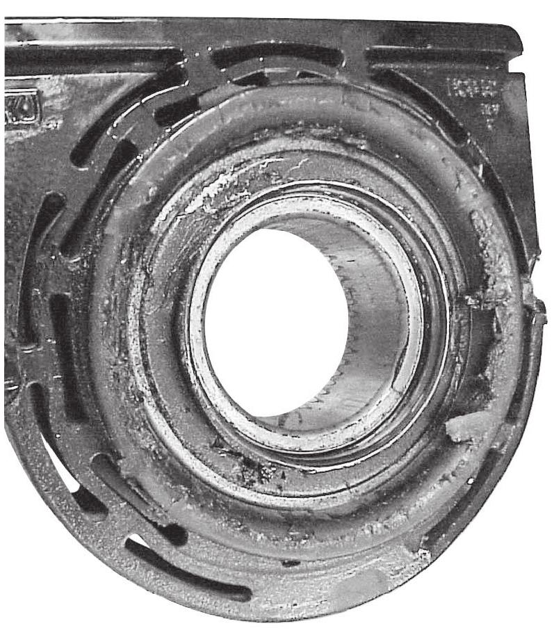 This condition does not require center bearing replacement. Figure 9.2 and Figure 9.3. Removal Coupling Shaft 1.