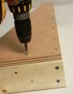 through the vertical member into the end grain of the horizontal member. 3. Attach the sides to the bracket: a.