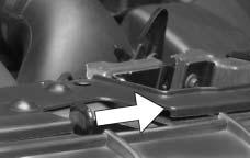 Then go to the front of the vehicle and find the secondary hood release lever.