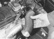 10 Fuel/exhaust systems - carburettor models 15.1 Remove the hot-air intake hose... 15.2... then undo the three retaining 15.