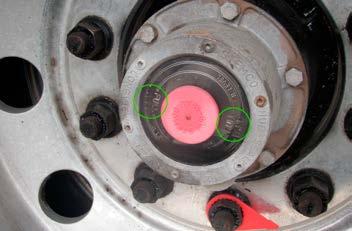 FIGURE 46 Wheel hub sight glass Level indicators Filler cap Sight glass Parts Covered and How to Inspect Them Minor Defects Major Defects Spare wheel support and fasteners Outside the