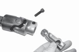 NOTE: This may be difficult, as the upper stub of the steering shaft is clamped inside of the hollow steering column.