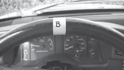 For future reference (in Step 20), count the number of turns required to turn the steering wheel from full lock to full lock. 20. While holding the wheel at full-lock in the counter-clockwise direction, place a piece of tape on the steering wheel in its current twelve o clock position.