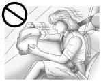 3-50 Seats and Restraints Children who are not restrained properly can strike other people, or can be thrown out of the vehicle. { WARNING Never do this.