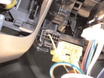 INSTALLATION TROUBLESHOOTING 1. LOCATE CONNECTOR E6 OF CLOCKSPRING BELOW RIGHT HAND SIDE STEERING COLUMN. REFER TO FIGURE 20 2. WITH IGNITION SWITCH ON, PLACE POSITIVE LEAD OF METER ON PIN 1 (DC). 3.
