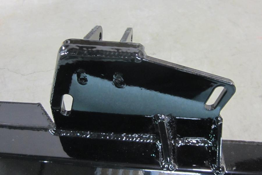 8. Install the Upper Control Arm (UCA) bolts into the slotted mounting holes.