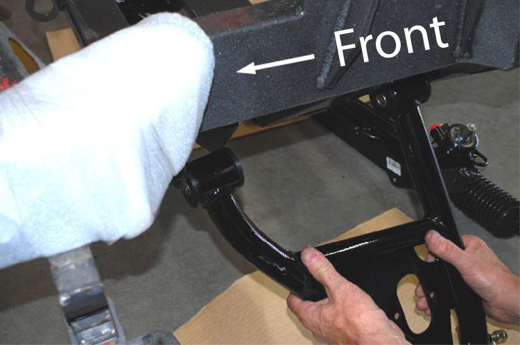 be located towards the rear. Install only the front ½ x 3 ½ mounting bolt at this time.