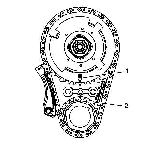 11. Place a straight edge across the front face of the engine block and inspect for proper installation of the camshaft actuator and timing chain.