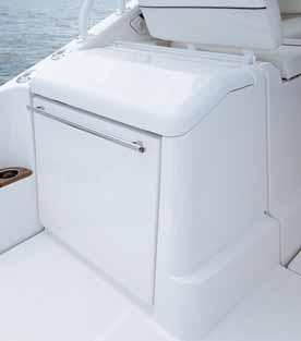 Aft of the port companion seat is a mezzanine bait prep center (with cutting board, sprayer and tackle