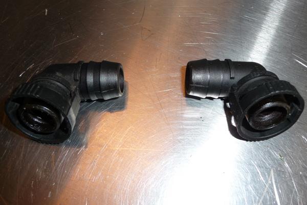 6. Next, it is necessary to remove the plastic convoluted tubing from the 2 barbed fittings. The BMW E46 M3 model is shown. Non BMW E46 M3 models will be slightly longer.