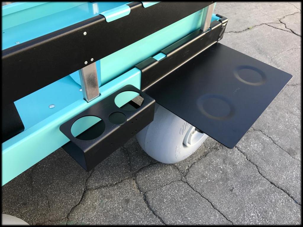 When not in use the side table can be placed on the inside of the deck. Pop up tent/surfboard side-rack option Side-racks should be placed on the right-hand side of the Sandhopper.