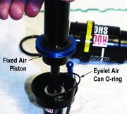 TIP: IT HELPS TO TWIST WHILE PULLING WHEN REMOVING THE AIR CAN. 6 8. Inspect/replace o-rings on the air piston and the large eyelet.