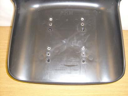 Under view of the 4 seat plate fixing bolts.