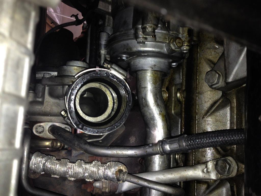 Remove the lower charge pipe.