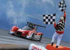 Both drove the battery powered Mitsubishi MiEV Evolution II race car, an improved version of last year s machine.