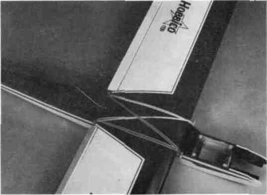 fuselage on the center line as shown Stretch the string to the corner of the elevator The distance from the pin to the corner must be