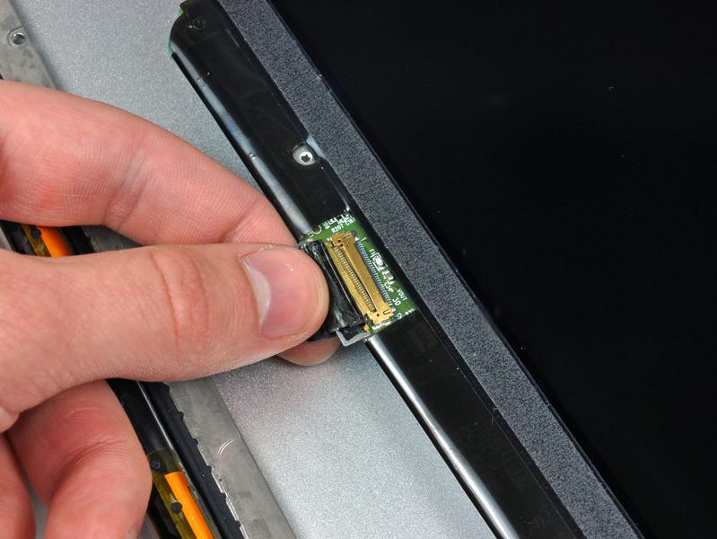 Pull the display data cable straight away from its socket on the LCD.