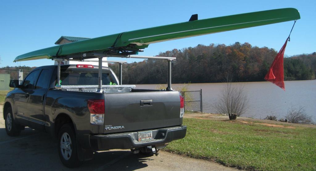 Step 3: Secure your double scull to your rack and vehicle Use (2) boat straps to secure your boat to your double scull rack.