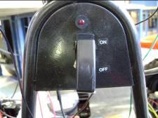 This switch can be seen in Figure 122 below. Figure 122: On/off switch under the steering wheel. 3.
