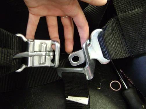 Figure 123: Securing the restraint system. 5. Secure the rider s feet using the foot straps at the front of the go-kart. This is seen in Figure 124 below. Figure 124: Foot straps. 6.