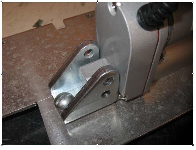 remained stationary. Another bracket was made to secure the shaft of the bracket.