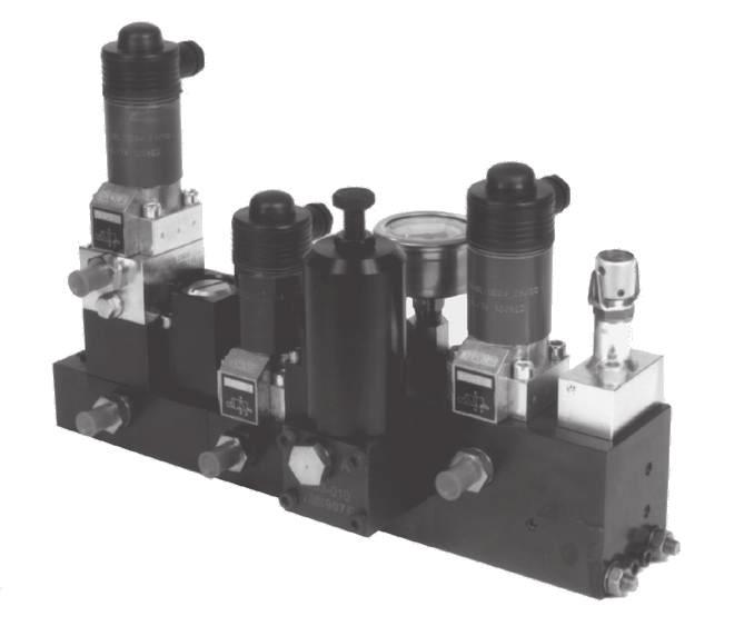 he high pressure die lifter circuit, operates at the clamp system pressure and includes a circuit relief valve. his safety valve prevents the rollblocks from being overloaded.