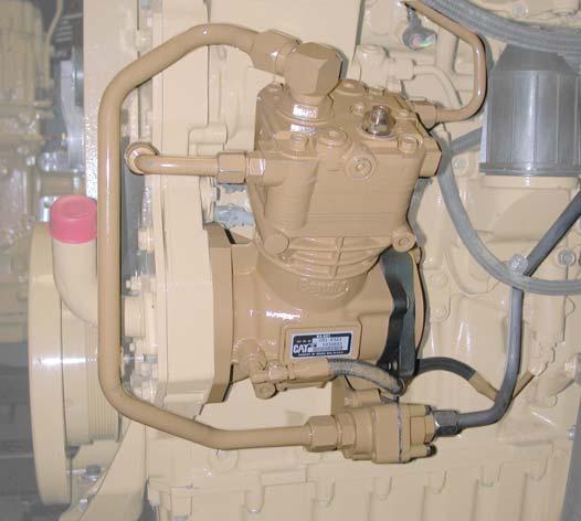 Inlet Line FIGURE 12 - EXAMPLE OF CATERPILLAR (ACERT ENGINE) C7/C9 COMPRESSOR AIR INDUCTION SYSTEM (TURBOCHARGED) Inlet Port Inlet Port Inlet Check Valve Inlet Line Expansion Tank Inlet Check Valve