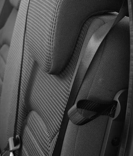 Pull the strap located in the center of each seat cushion forward, and fold each seat cushion