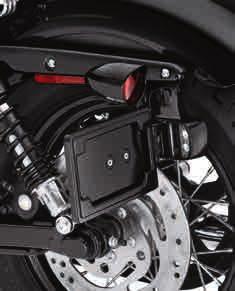 SIDE-MOUNT LICENSE PLATE KIT BLACK H. SIDE-MOUNT LICENSE PLATE KIT Add a clean, custom look to the rear fender.