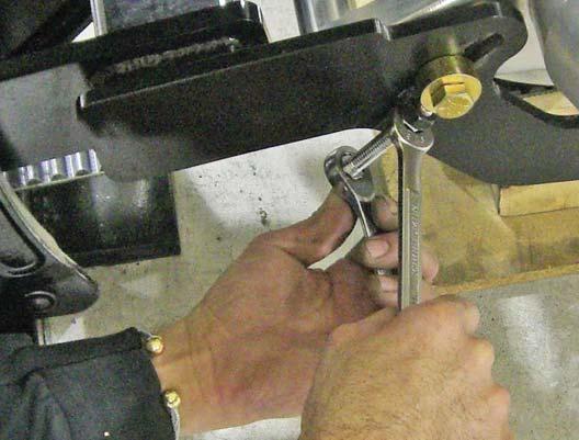 Adjust belt tension to factory specs.