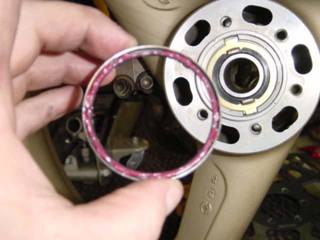 While the wheel is off, I occasionally remove the front seal and clean that - along with the speedometer drive ring.