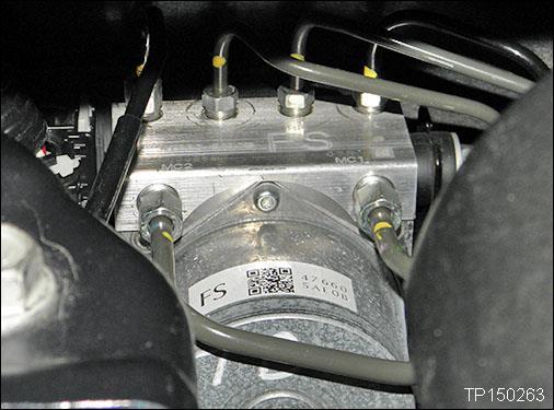 of the engine compartment behind the engine. Figure 1 2.