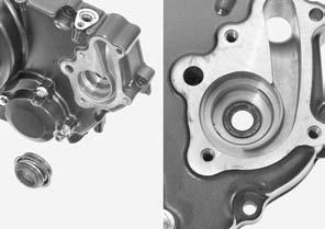 COOLING SYSTEM Remove the mechanical seal and oil seal from the right crankcase cover.