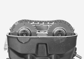 CYLINDER HEAD/VALVES Align the outside index line ("IN" and "EX" marks) on the cam sprockets with the cylinder head top surface as shown.