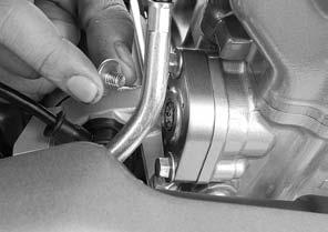 Install and tighten the cam chain tensioner lifter plug to the specified torque. TORQUE: 4.2 N m (0.4 kgf m, 3.