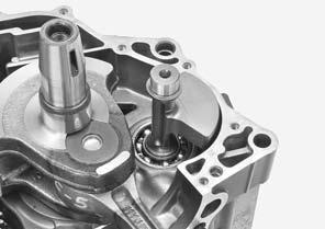 Remove the balancer shaft from the right crankcase. Install the balancer shaft into the right crankcase. Assemble the crankcase (page 14-18).