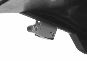 Use a drill or an equivalent tool when removing the helmet holder mounting bolts.
