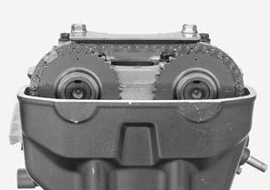 MAINTENANCE Make sure that the outside index lines ("IN" and "EX" marks) on the cam sprockets are flush with the cylinder head top surface and facing outward as shown.