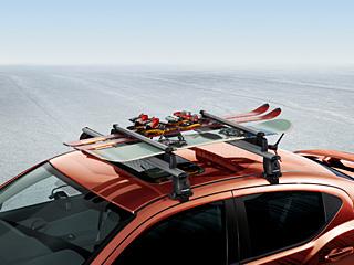 Racks Ski & Snowboard Ski & Snowboard - Roof-Mount - Roof-Mount The large Ski and Snowboard Carrier holds up to six pairs of skis or four snowboards, or a combination of both.