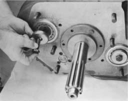 Use the proper bearing driver to set the bearing (inset). 2.