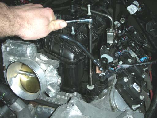 bracket and remove the alternator from the vehicle. This will be re-installed later on.