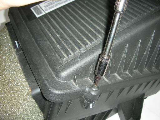 101. Use a 15mm socket wrench to lever the tensioner all the way down, then insert the