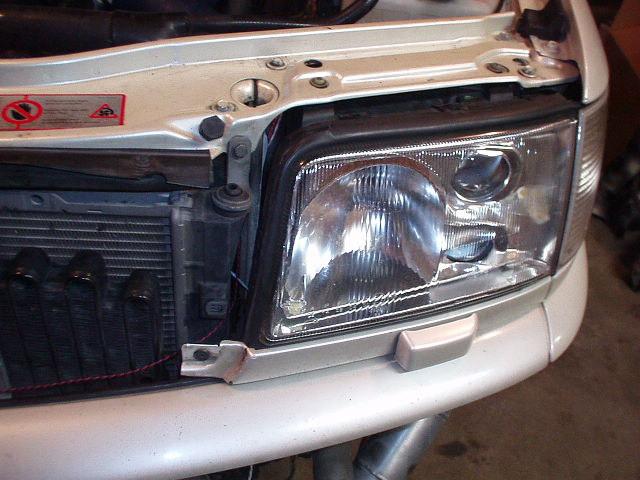 5) Remove the drivers side headlight by removing the 4 Phillips head screws which hold it in.