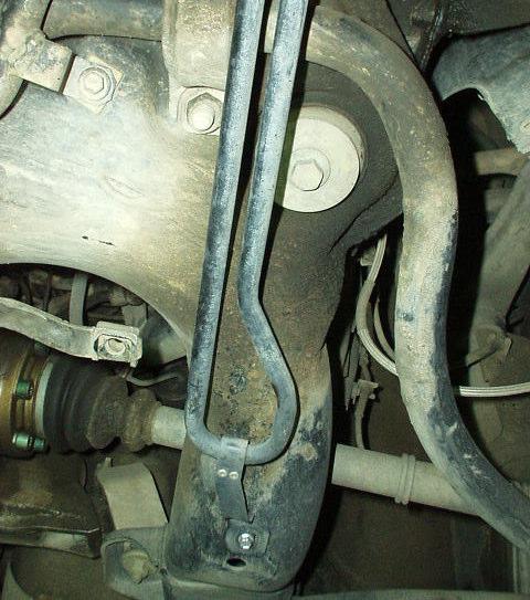 It is not necessary to remove the lines from the power steering cooler to complete this operation, the hoses will swivel.